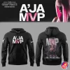 Front and back of the A'ja Wilson MVP black hoodie. The front has 'A'JA MVP' text, the back features a graphic of her on a throne.