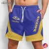 A man wearing custom Baltimore Ravens shorts in blue and gold, featuring the team logo and an option for a personalized name.