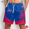 Front view of a man wearing custom Buffalo Bills shorts in blue and red, featuring the team logo and a spot for a custom name.