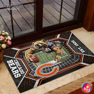 The Chicago Bears doormat featuring a bear mascot and stadium graphic placed on a stone step in front of a glass door.