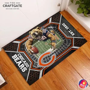 The Chicago Bears Est 1920 fan doormat laid on a hardwood floor in front of a white door, viewed from above.