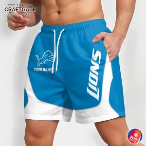 An angled side view of the custom Detroit Lions shorts, highlighting the "LIONS" text on the leg and the team logo on the front.