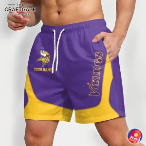 An angled side view of a model wearing the custom Minnesota Vikings shorts, showing the side pocket and vertical "Vikings" team name.