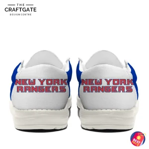 Rear view of the New York Rangers loafer shoes, showing the "NEW YORK RANGERS" text printed on the back of each heel.