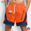 A man wearing custom NFL Denver Broncos shorts in orange and navy blue, showing the team logo and personalized name option.