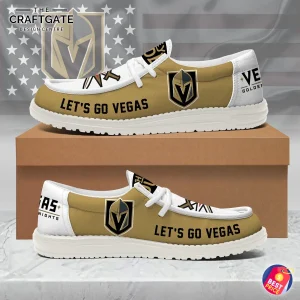 A pair of Vegas Golden Knights loafer shoes from the side, showing the team logo and "LET'S GO VEGAS" on a gold and white design.