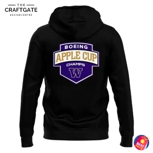 Back of the black Washington Huskies Apple Cup 2025 Champs hoodie with the Boeing Apple Cup Champs logo in purple, gold, and white.
