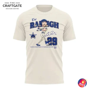 Front of the off-white Cal Raleigh MVP t-shirt featuring a cartoon graphic of him batting, his name, number 29, and signature.