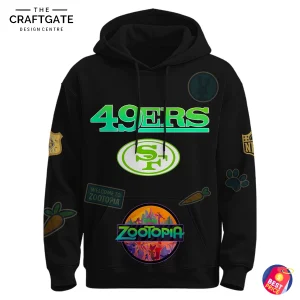The front of the black San Francisco 49ers x Zootopia 2 hoodie, showing the 49ers logo and various Zootopia-themed patches.