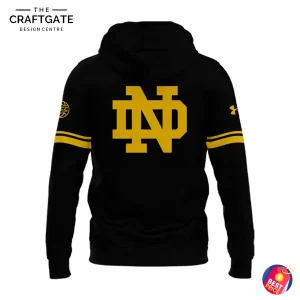 Back view of the black Notre Dame The Bend 2025 hoodie, showcasing the large gold interlocking ND monogram logo and gold sleeve stripes.