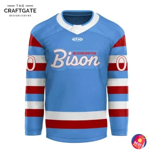 A front view of the light blue Bloomington Bison hockey jersey featuring the team name in script and red and white stripes.