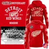 Promotional image for the Detroit Red Wings 100th Anniversary hoodie, showing the front, back, and a vintage team photo.
