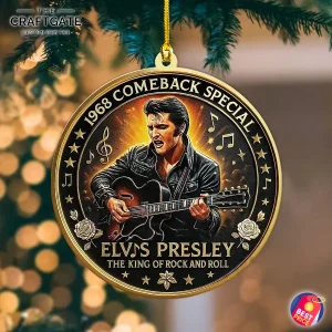 Front view of the Elvis Presley 'The King' acrylic ornament hanging on a tree with a warm, glowing bokeh light background.