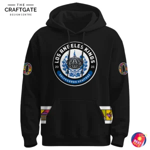 Front of the LA Kings Salvadoran Heritage hoodie, featuring a crest with the Salvadoran coat of arms and colorful folk art details.