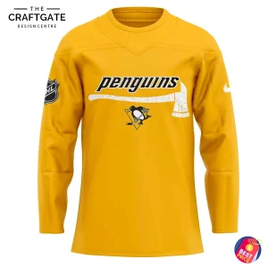The front of the yellow Pittsburgh Penguins Firefighter jersey, featuring the Penguins wordmark underlined by a firefighter's axe.