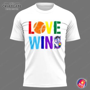 The front of the Seattle Mariners Love Wins shirt featuring rainbow text, with a baseball replacing the letter O in LOVE.