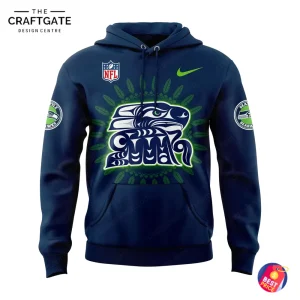 Front of the navy blue Seattle Seahawks Indigenous Peoples Day hoodie featuring a tribal bird design, NFL shield, and Nike swoosh.