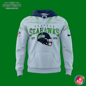 Front of the light grey Seattle Seahawks Rivalries hoodie, featuring the team helmet logo, Est. 1976 text, and a navy hood.